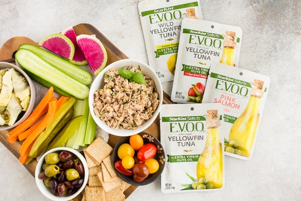lemon herb tuna salad surround by tuna pouch packaging