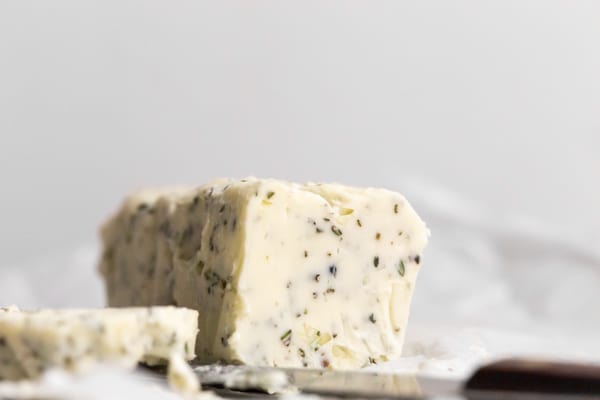 garlic herb compound butter sitting on paper