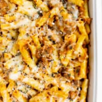creamy pumpkin baked ziti in a white dish
