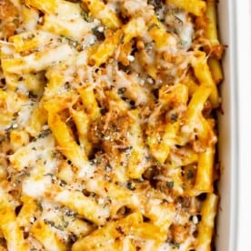 creamy pumpkin baked ziti in a white dish