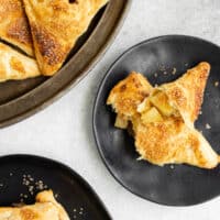 easy apple turnovers cut open on a plate