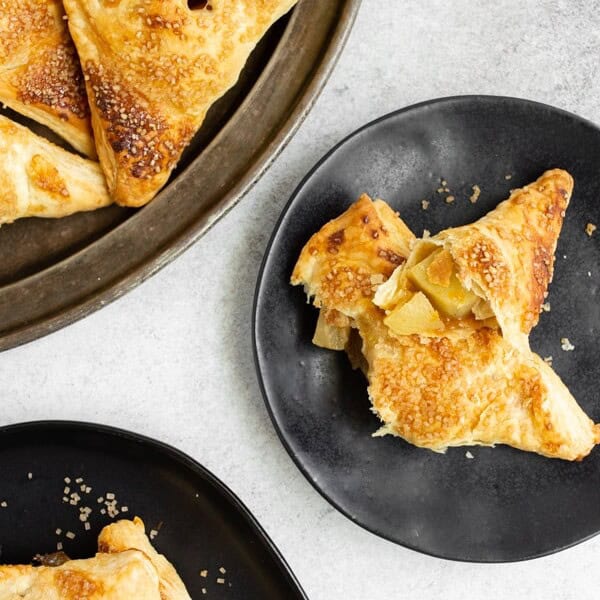 easy apple turnovers cut open on a plate