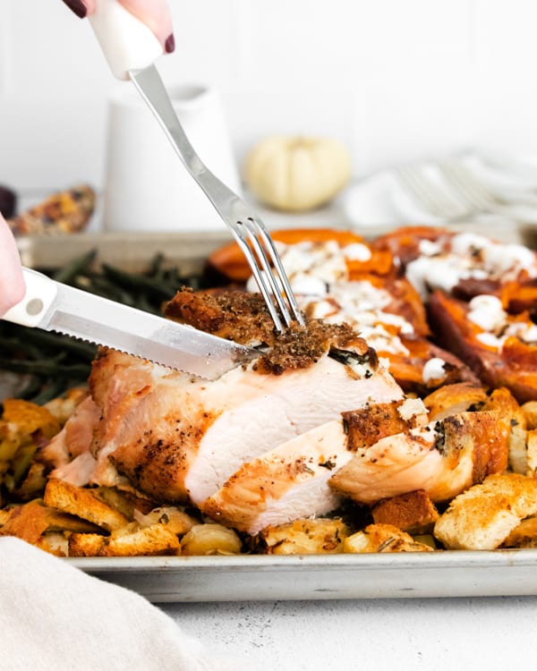 sheet pan thanksgiving dinner slicing the turkey