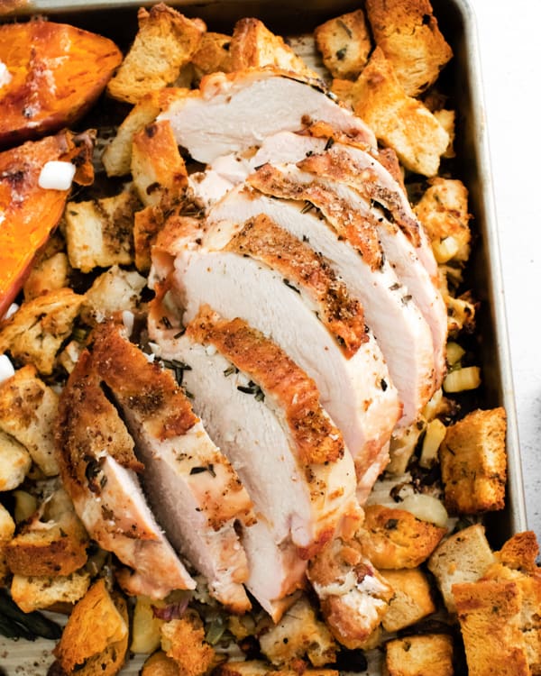 Sheet Pan Thanksgiving dinner showcasing the sliced turkey