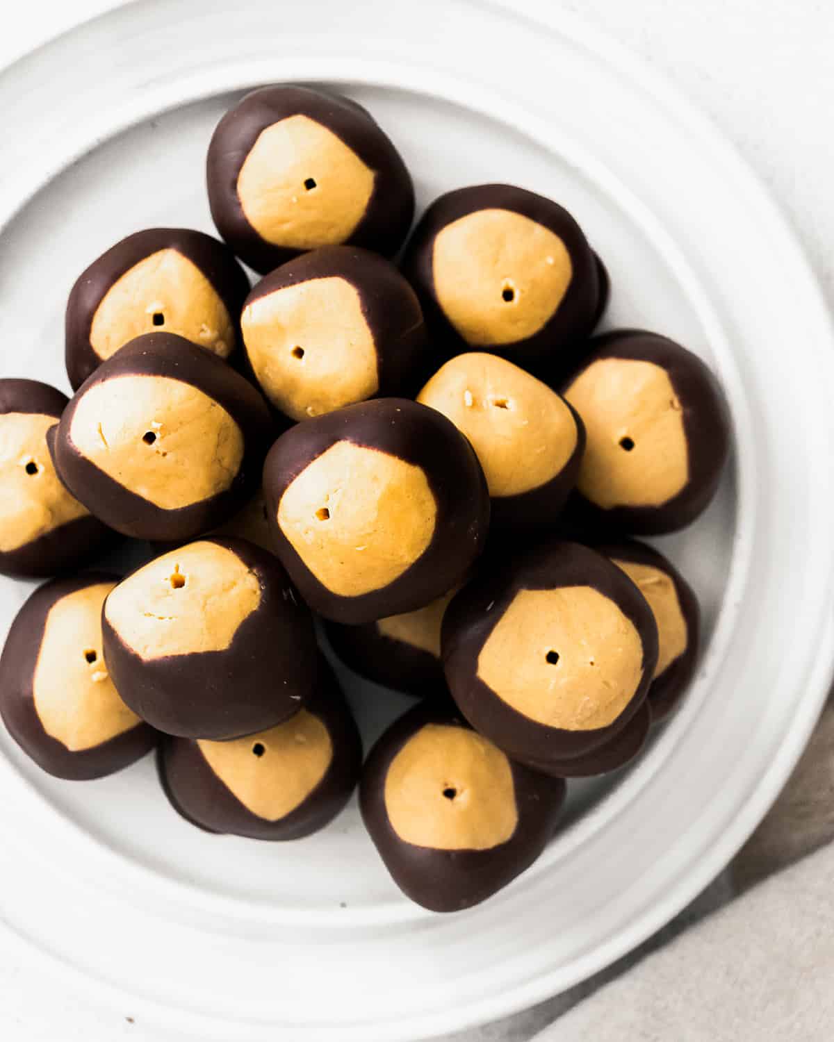 a plate of peanut butter buckeyes