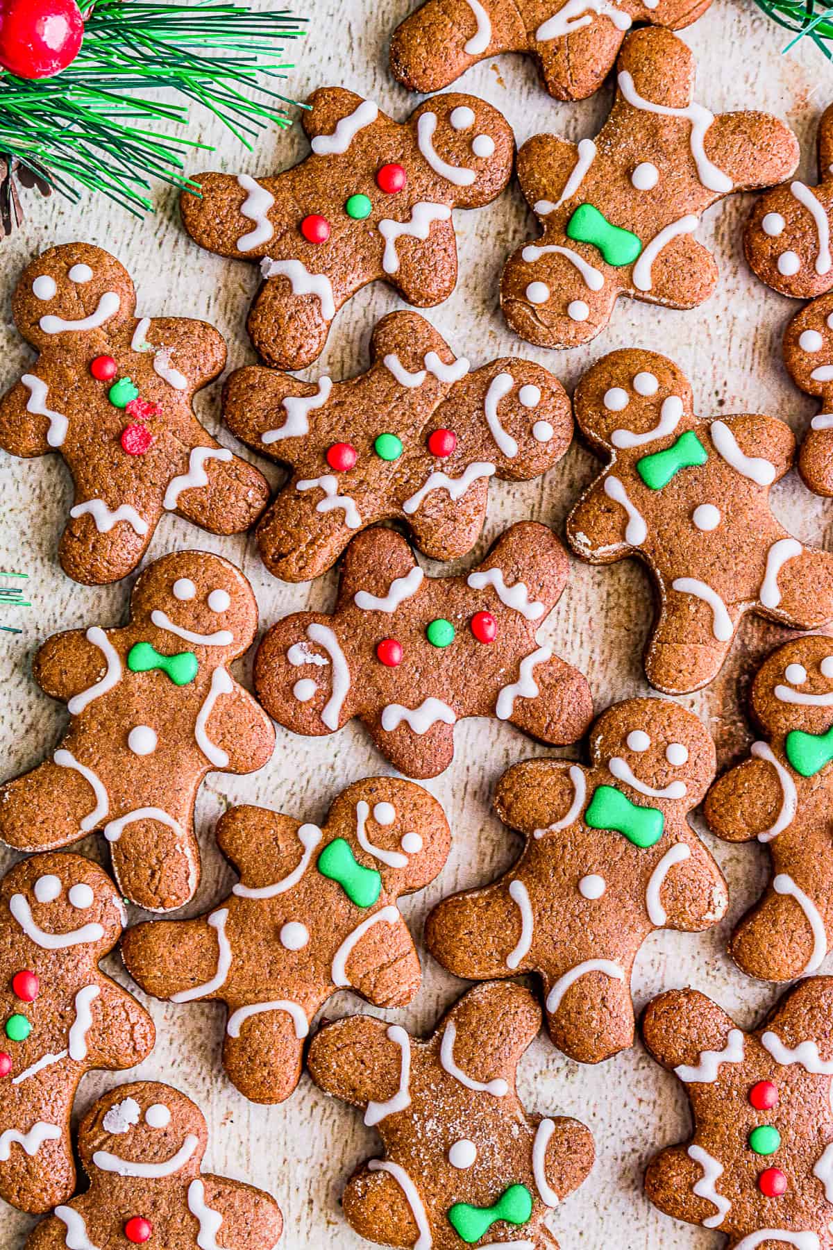 soft gingerbread cutout cookies laid out on a board