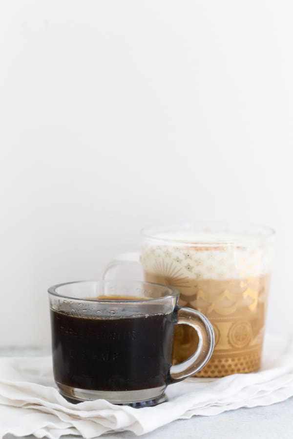 homemade cinnamon dolce syrup in a glass measuring cup