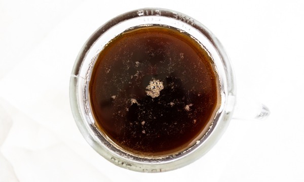 homemade cinnamon dolce syrup in a glass