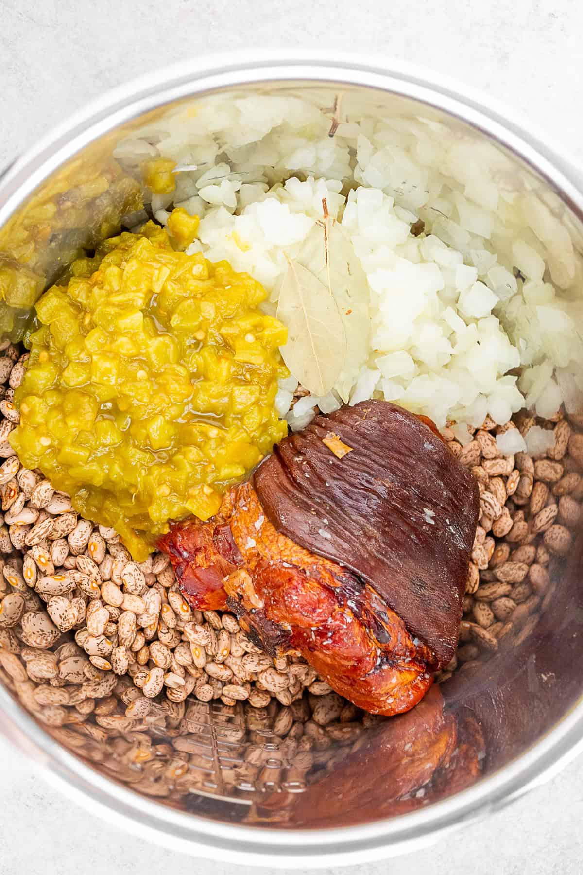 Ingredients in the pot for Instant Pot pinto beans
