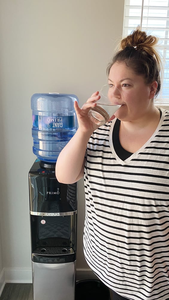 drinking a glass of water
