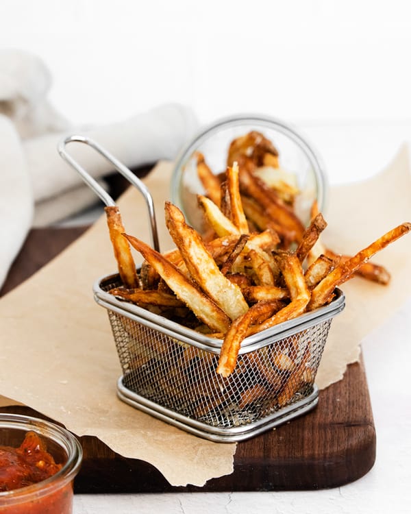 Garlic Parmesan Air Fryer French Fries in a basket