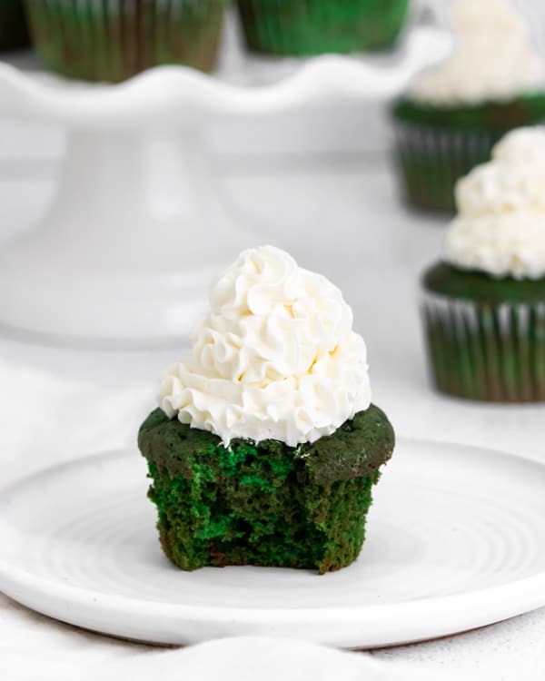 Green velvet cupcakes with a bite taken out of it