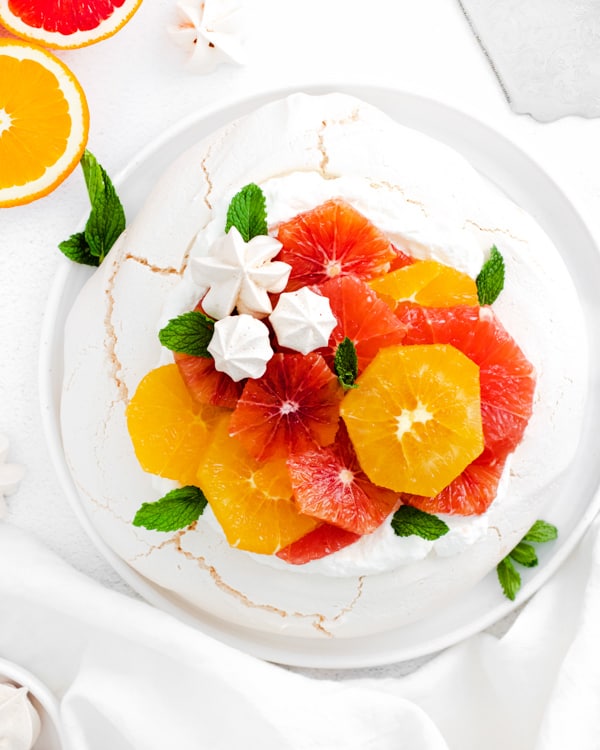 winter citrus pavlova on a white plate