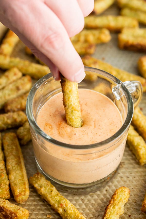 veggie fries being dipped into homemade fry sauce.