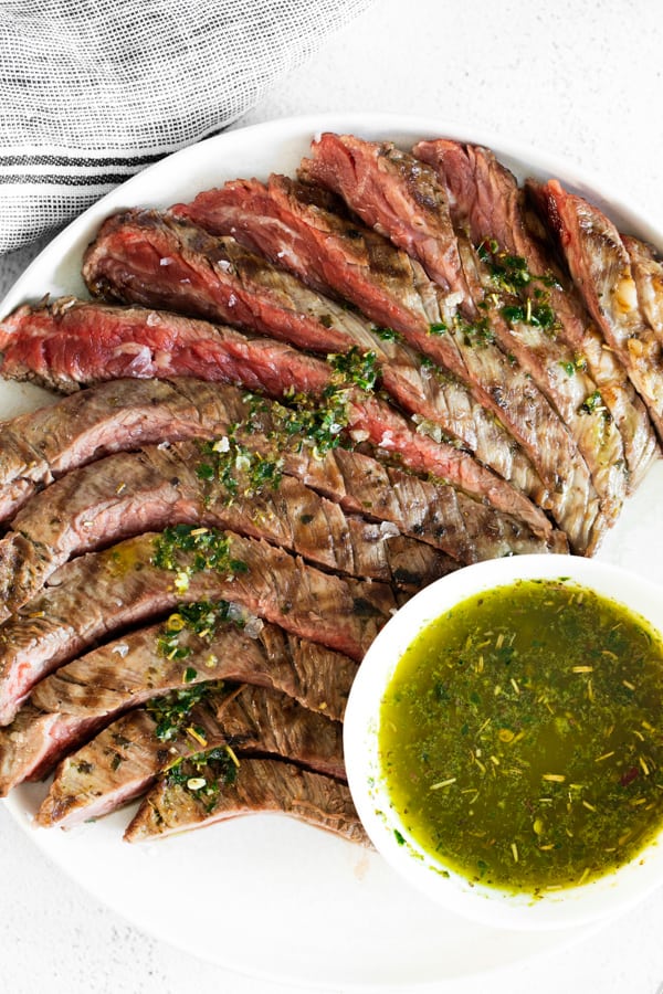 sliced grilled chimichurri flank steak.