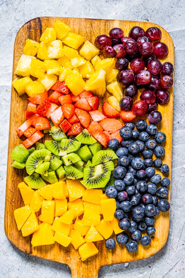 chopped fruit on a cutting board.