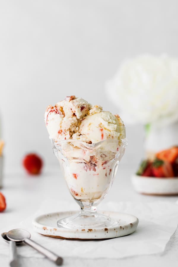 strawberry cheesecake ice cream in an ice cream bowl. 