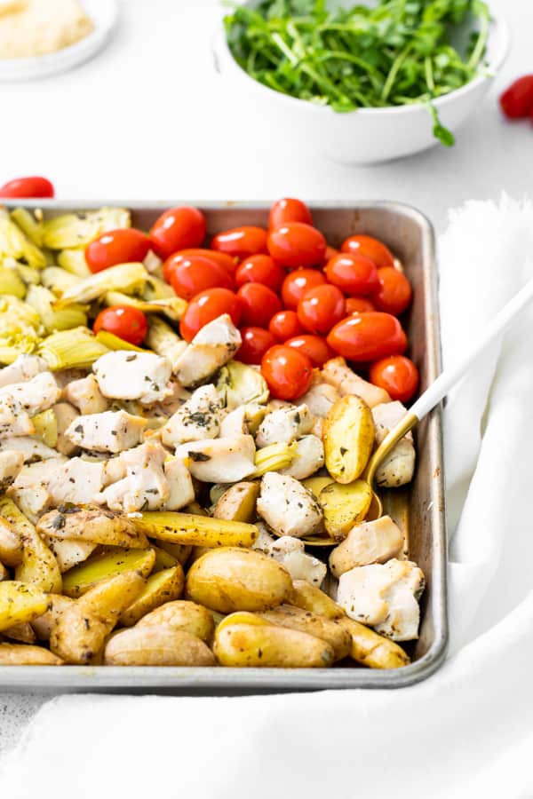 Sheet Pan Mediterranean Chicken fully cooked on the sheet pan.