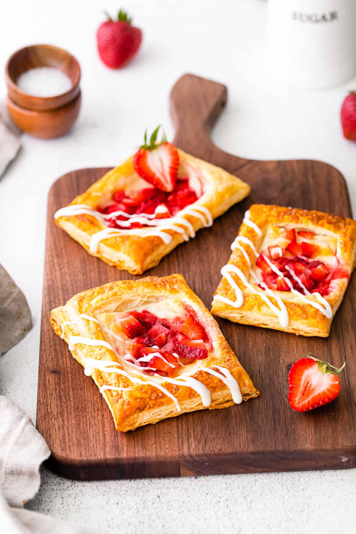 easy strawberry cheesecake Danish drizzled with glaze. 