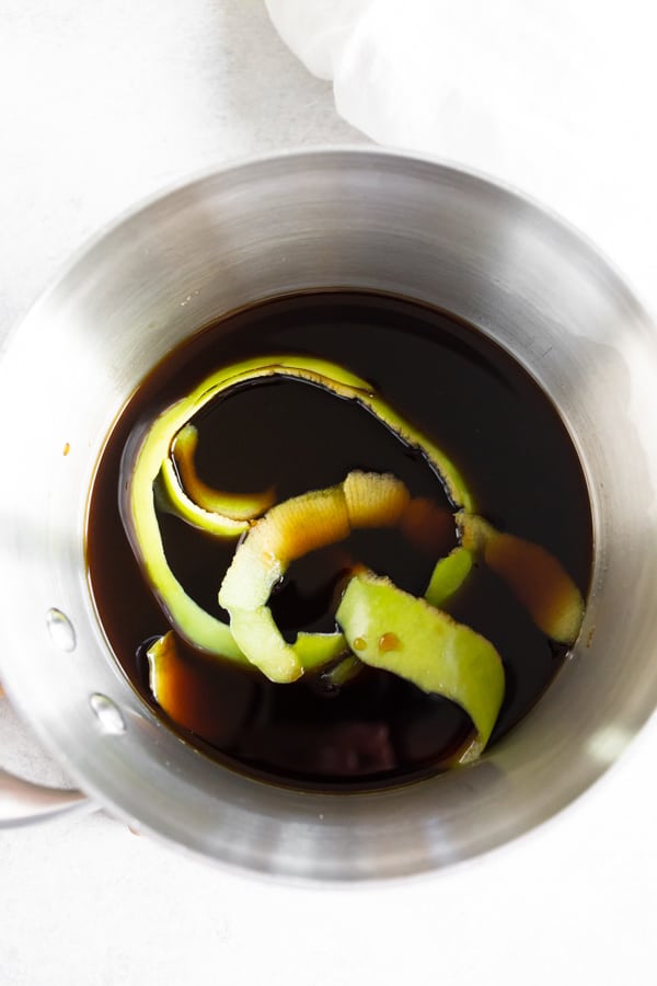 Uncooked apple brown sugar molasses coffee syrup in a pot. 