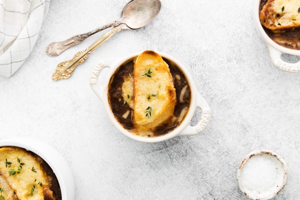 French Onion Soup topped with cheese and bread. 