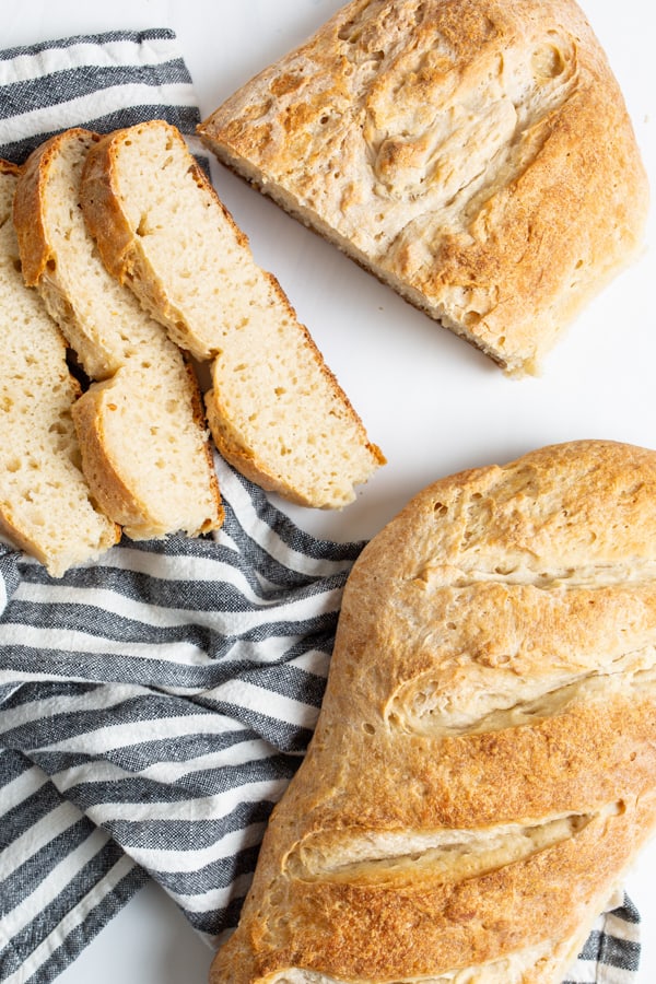 A few slices and whole loaf of No Yeast Sourdough Bread.