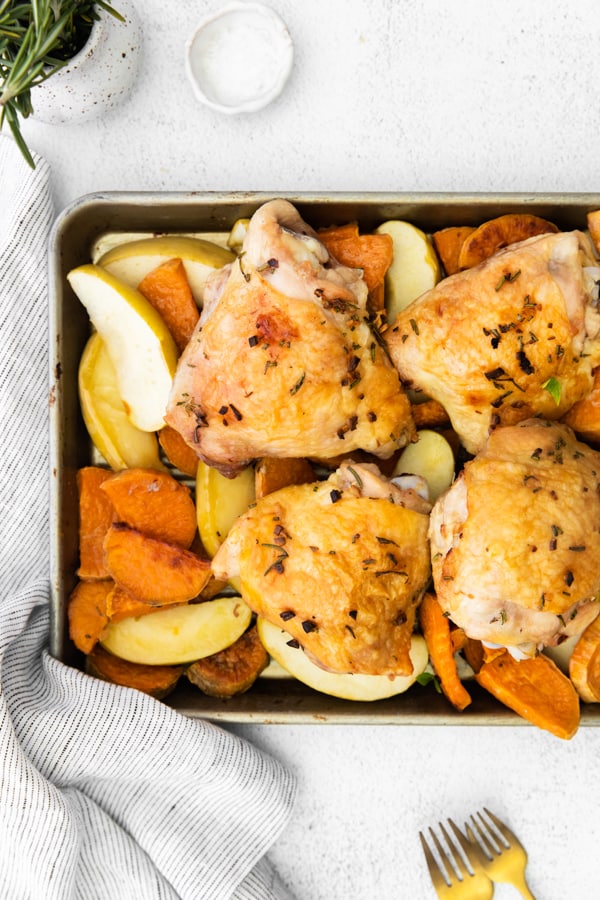 Sheet Pan Chicken and Apples cooked on a sheet pan.
