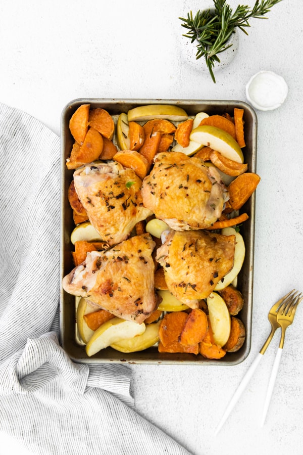 Sheet Pan Chicken and Apples fully cooked served on the sheet pan.