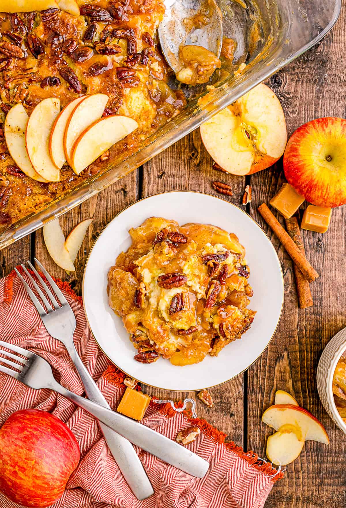 Caramel Apple Dump Cake spooned onto a plate. 