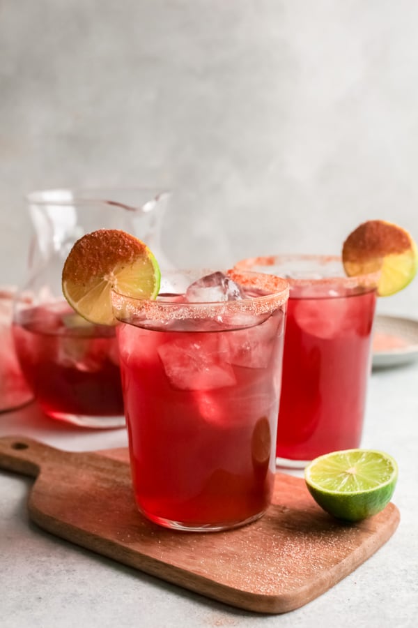 El Diablo Cocktail served in a short cocktail glass with a lime wedge. 