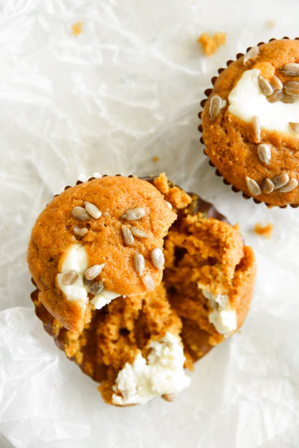 Pumpkin Cream Cheese Muffins broken in half.