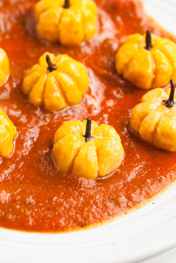 Showing off the stem of Pumpkin Shaped Gnocchi.