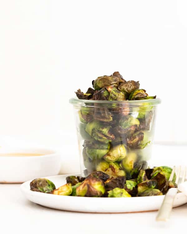 Air Fryer Brussels Sprouts served on a white plate. 
