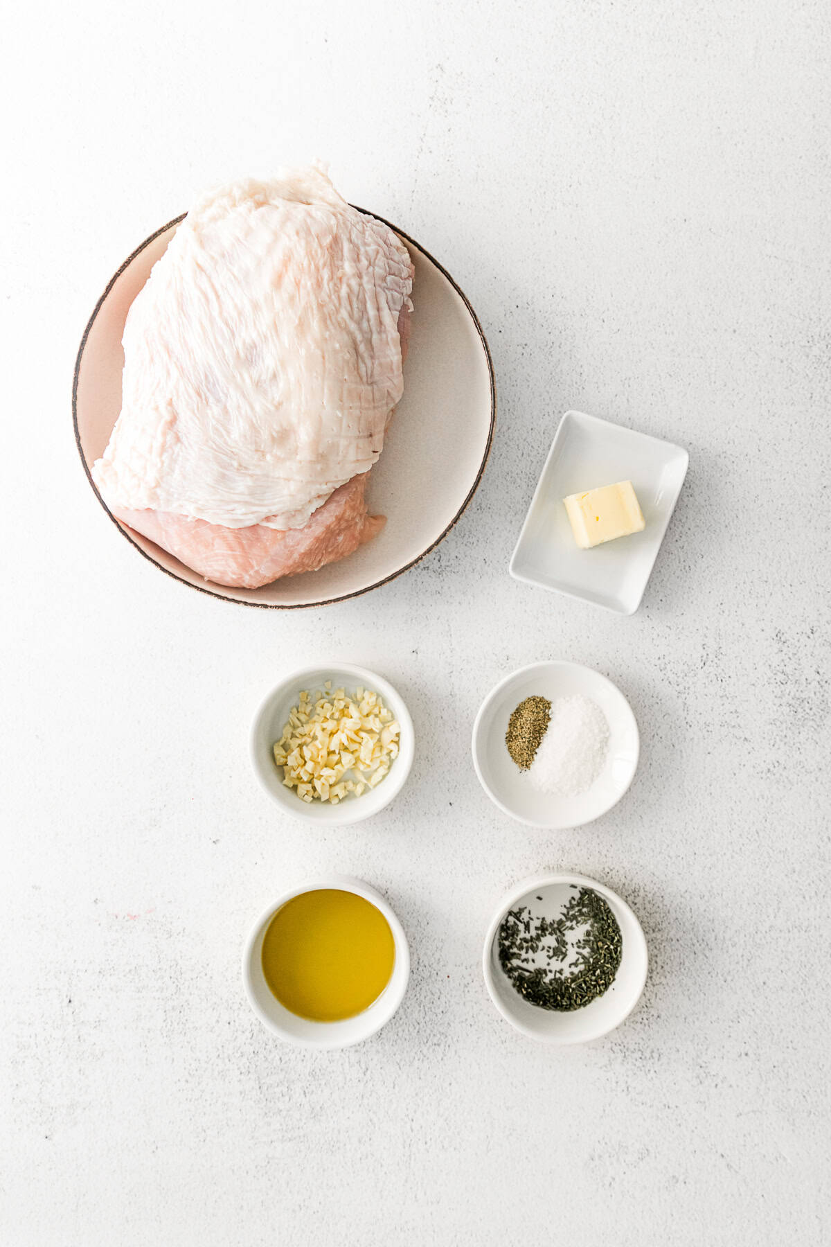 Ingredients to make air fryer turkey breast on a table.