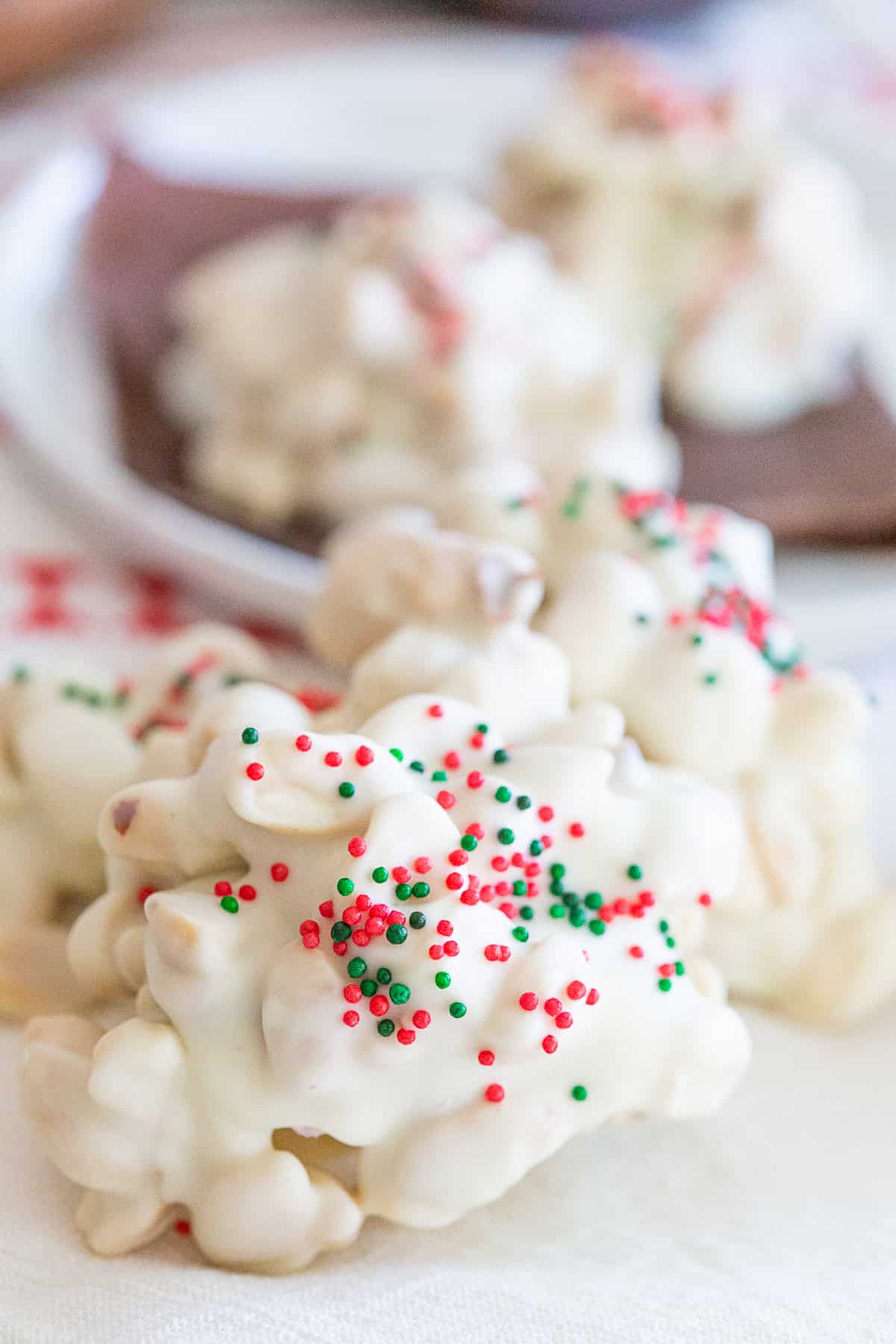 Salted Peanut Clusters covered in sprinkles.