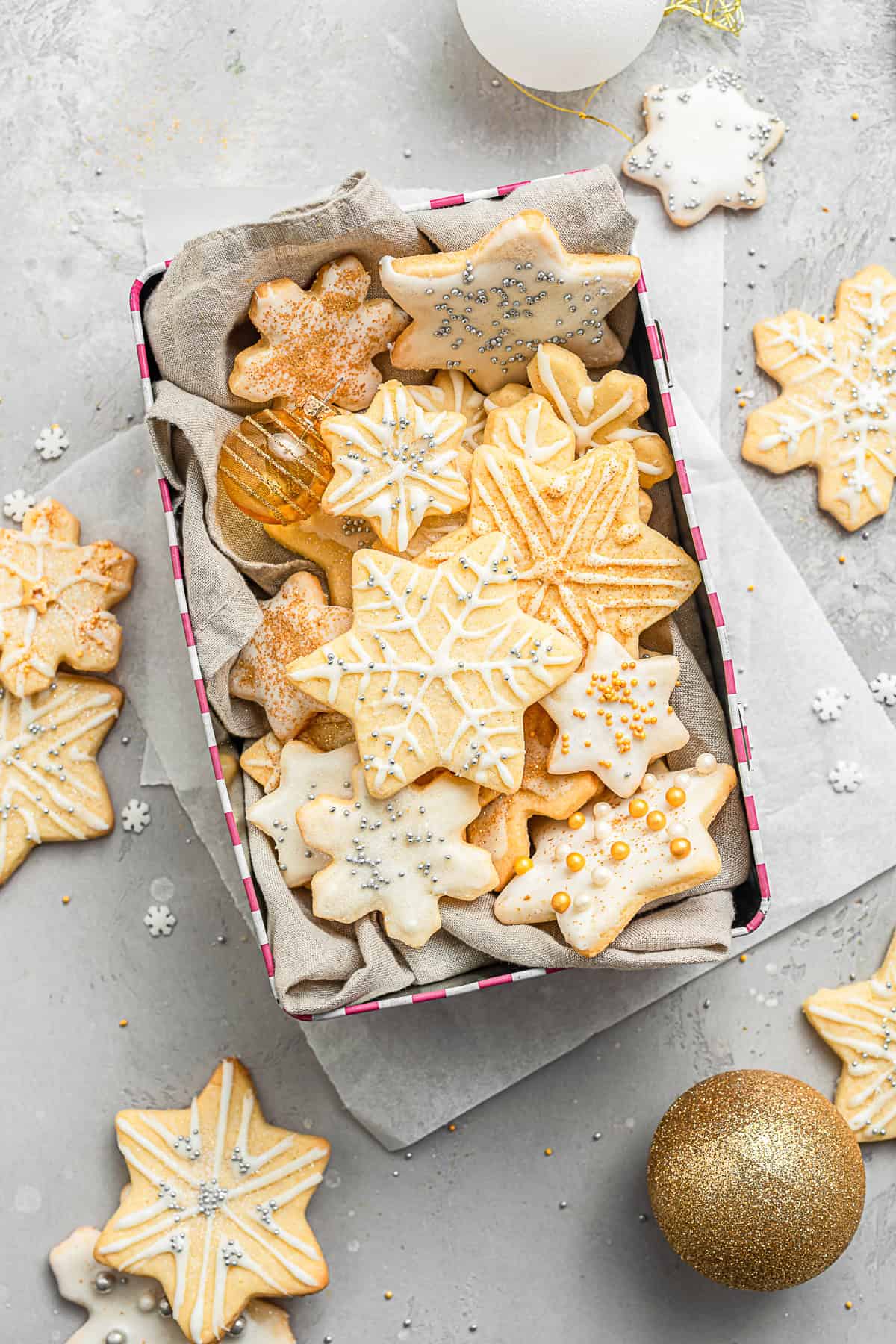 Almond Sugar Cookies in a cookie tin.