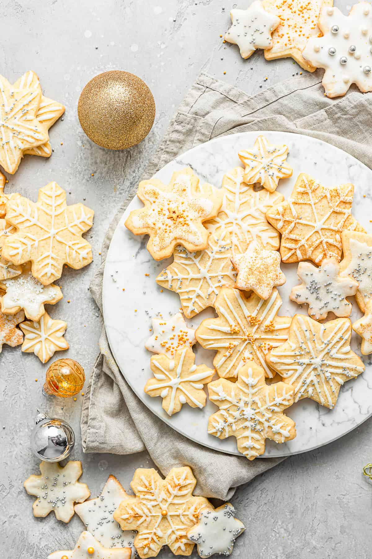 Almond Sugar Cookies on a marble plate.