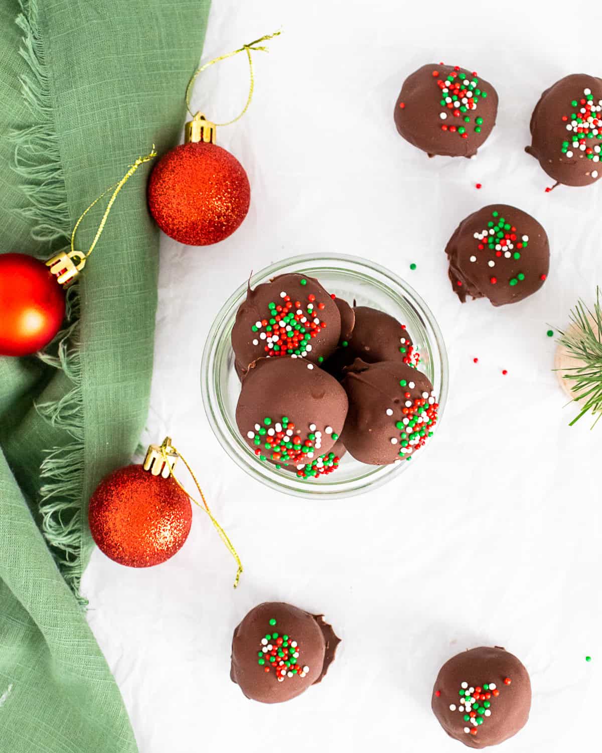Christmas Oreo Truffles on a table.