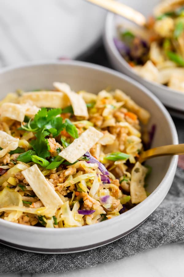 Ground Chicken Egg Roll Bowl topped with wonton strips.