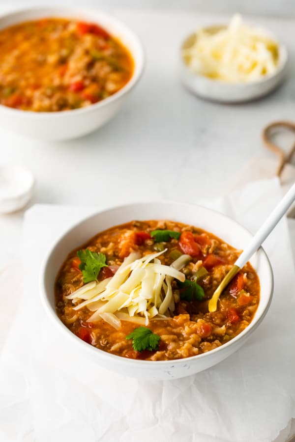 Instant Pot Stuffed Pepper Soup in a bowl with a spoon.