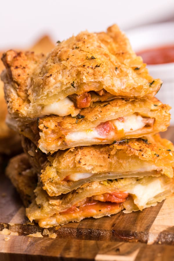 Air Fryer Hot Pockets sliced on a cutting board.