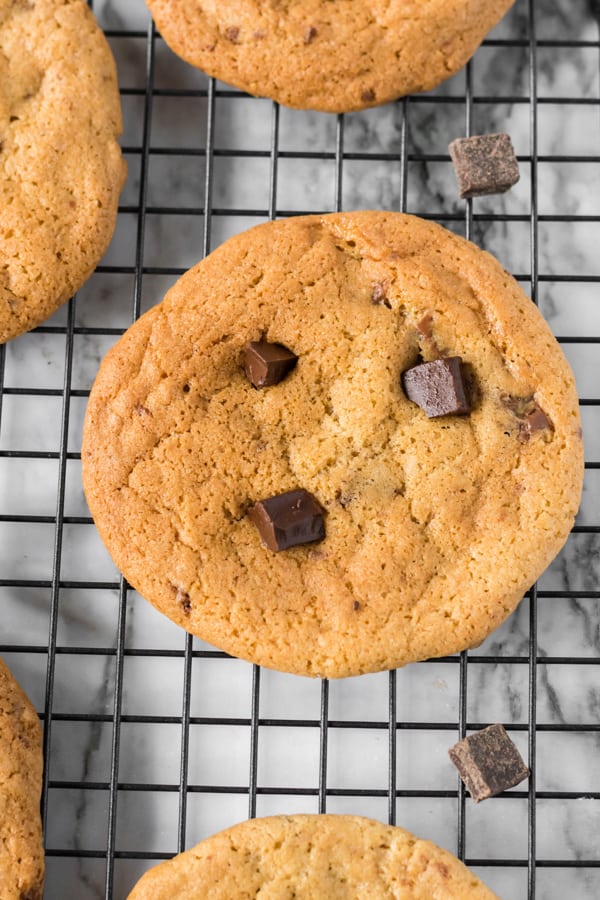 Caramel Chocolate Chip Cookies on a cooling rack.