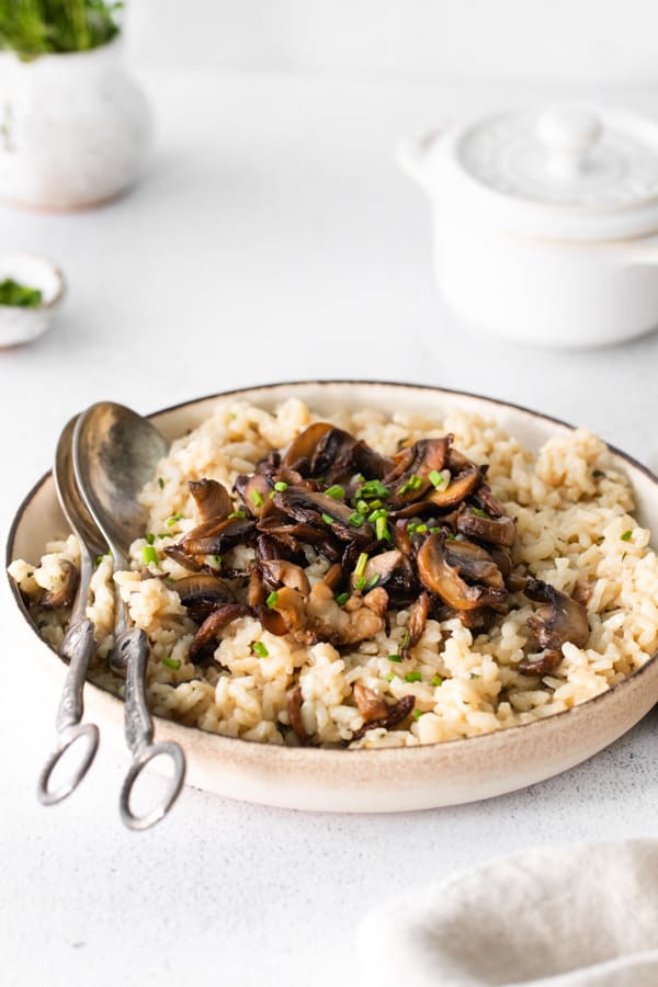 Wild Mushroom Risotto served in a white bowl.