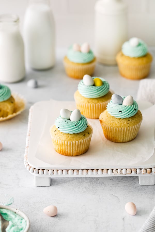 Robin Egg Cupcakes served with candy eggs on top.