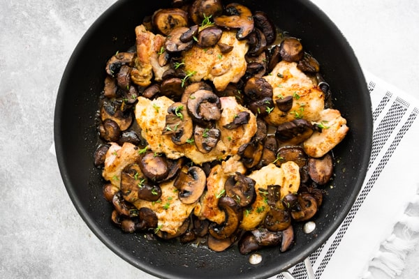Garlic Mushroom Chicken Thighs sitting in a pan.