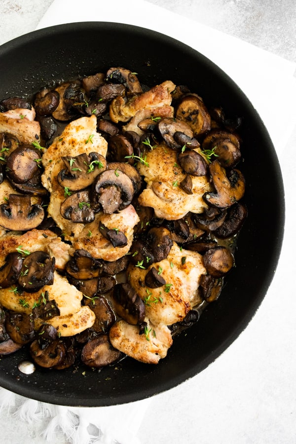 Garlic Mushroom Chicken Thighs in a pan.