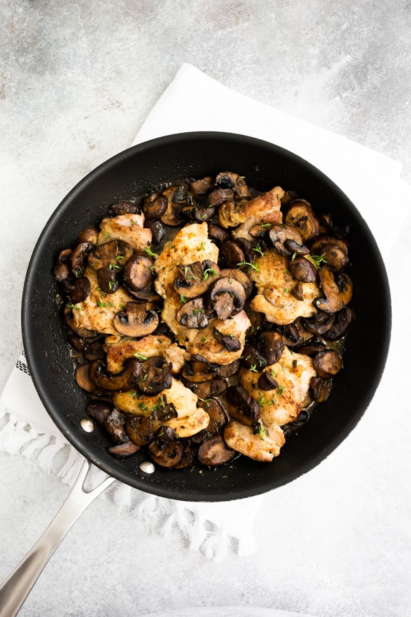 Garlic Mushroom Chicken Thighs served in a pan.