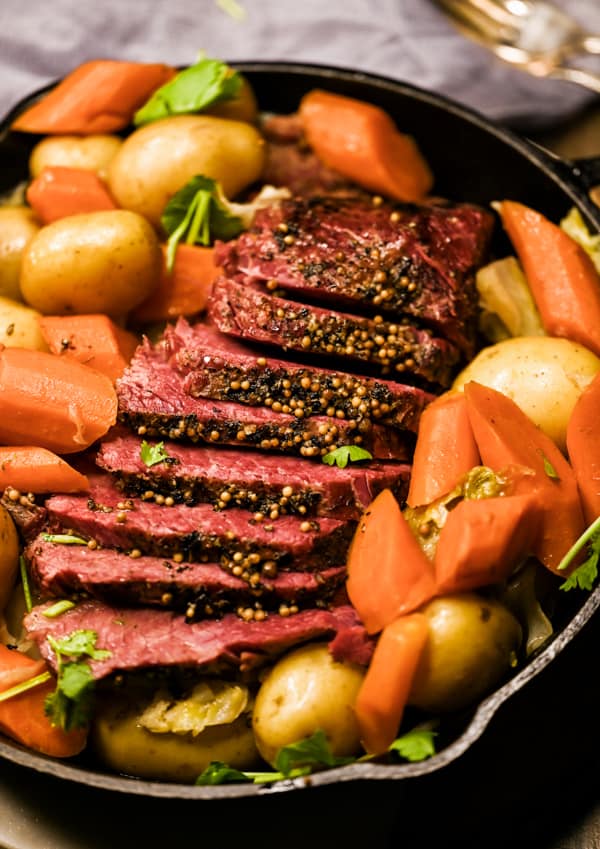Instant Pot Corned Beef sliced on a platter. 