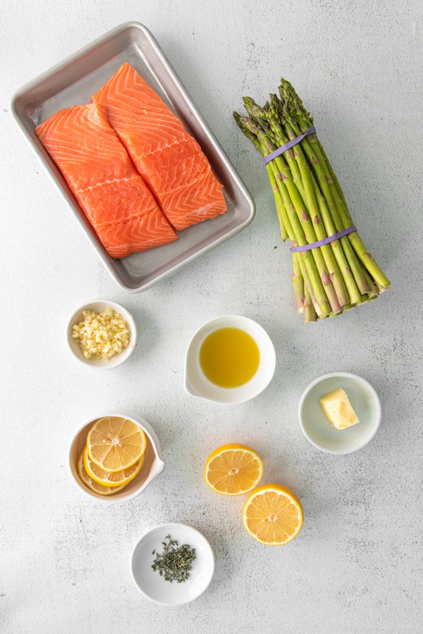 Ingredients for Sheet Pan Lemon Salmon laid out 