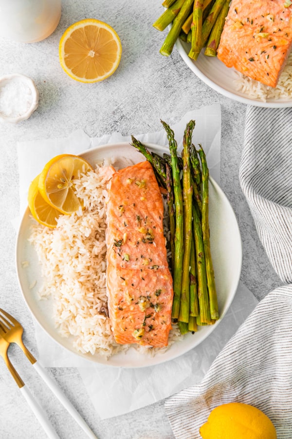 Sheet Pan Lemon Salmon on a white late.
